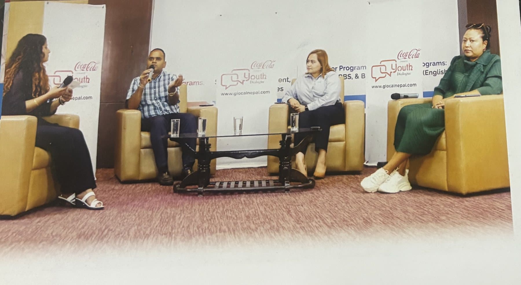 Panel discussion with guest speakers on stage