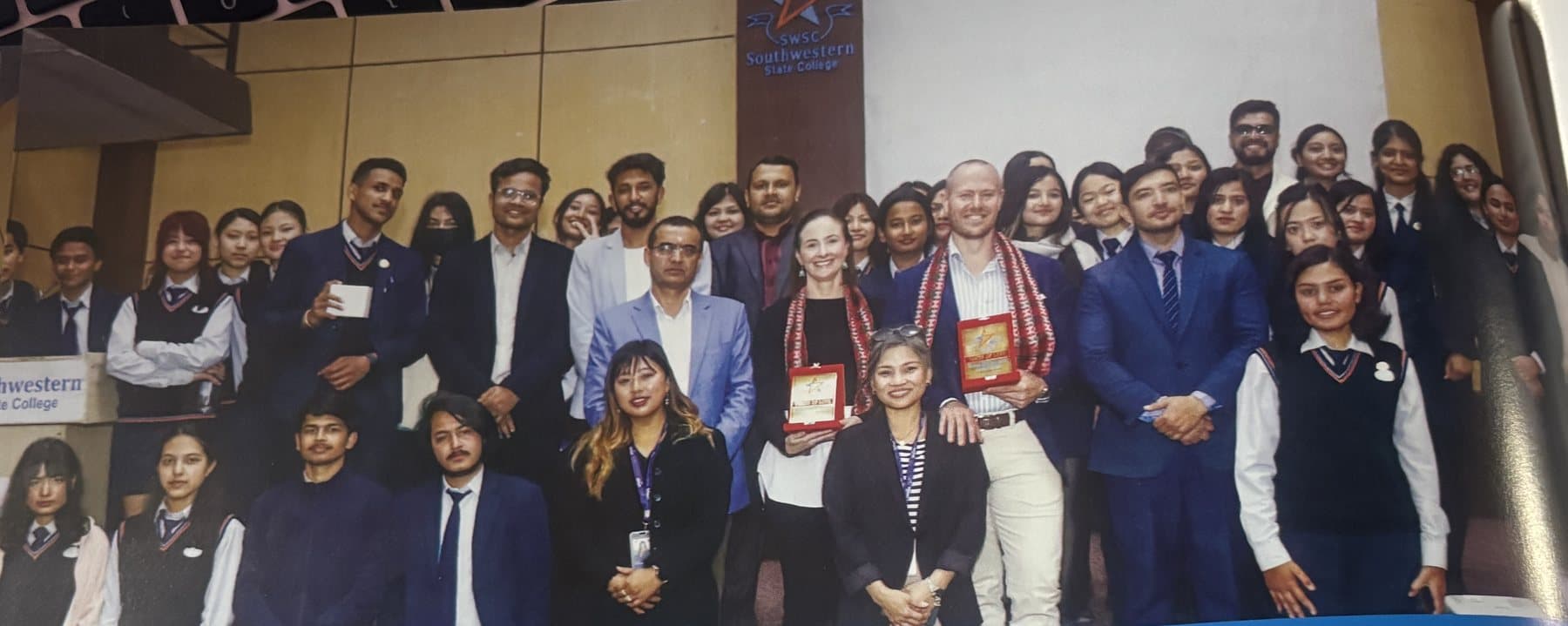 Students with industry guests after a professional development session